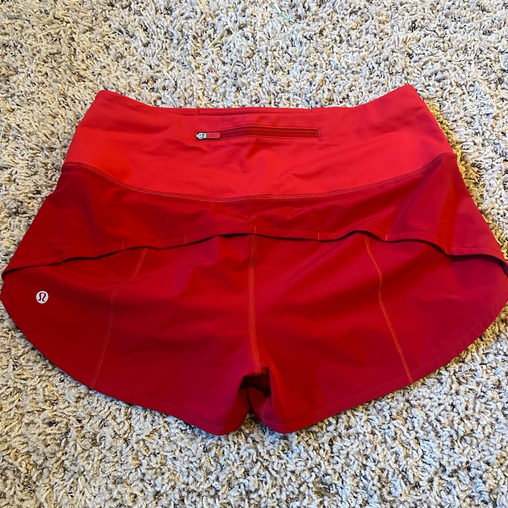 Red high-rise Lululemon Speed Up shorts - 2.5” length